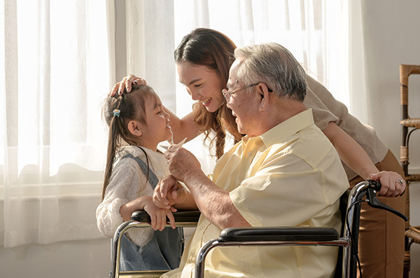 grandfather playing with his granddaughter